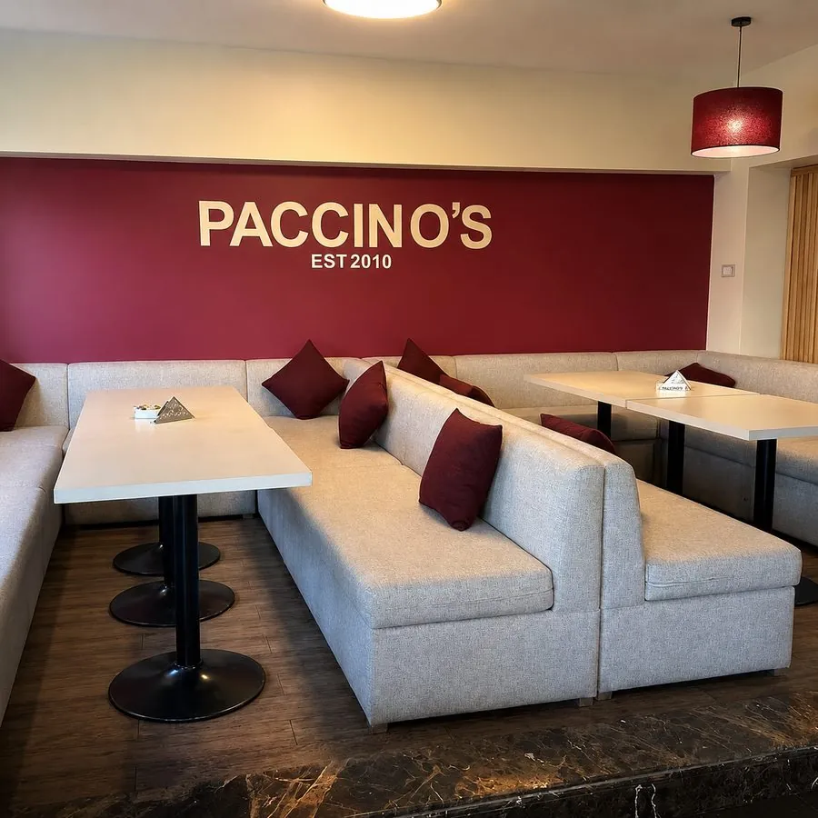 Indoor seating area inside Paccino's Minya