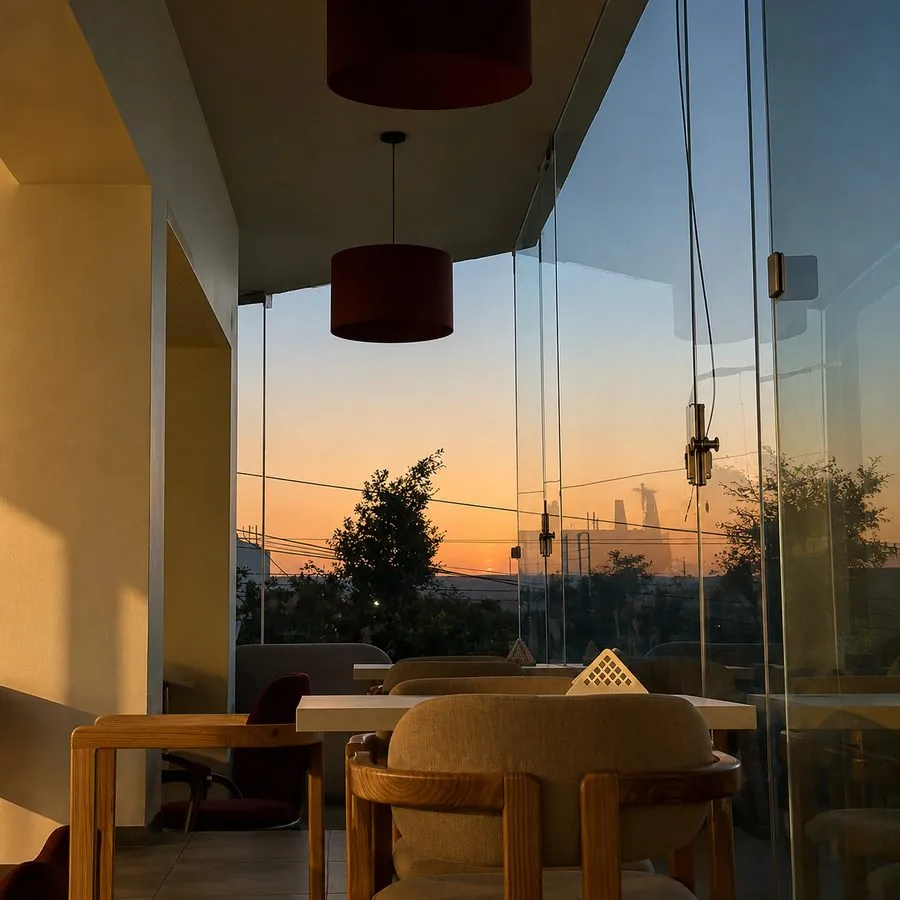 Quiet corner table at sunset in Paccino's Minya